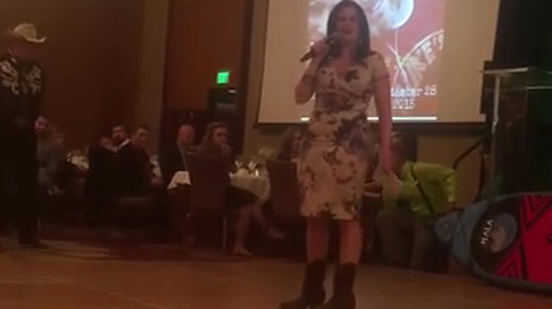 Kamille Bauer on stage at the Epic Experience Annual Gala